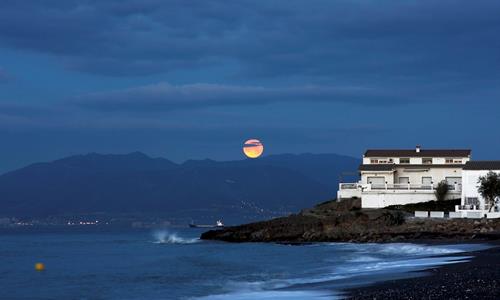 View from La Araña Beach at night. View from La Araña Beach at night.