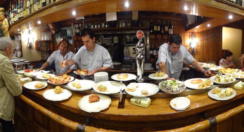 preparing the food - tiqy, Flamenco and Tapas Tour at Night
