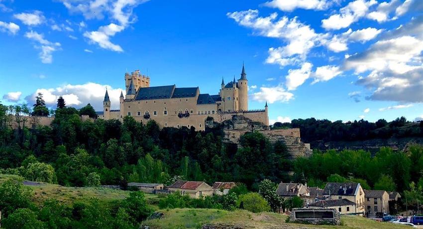 the Alcazar of Segovia - tiqy, Segovia with a Small Group with a Glass of Wine in Your Hand