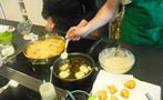 learning how to cook tortilla española - Tiqy, Spanish Cooking Class